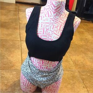 Adorable two tone cutout one piece tank swimsuit.